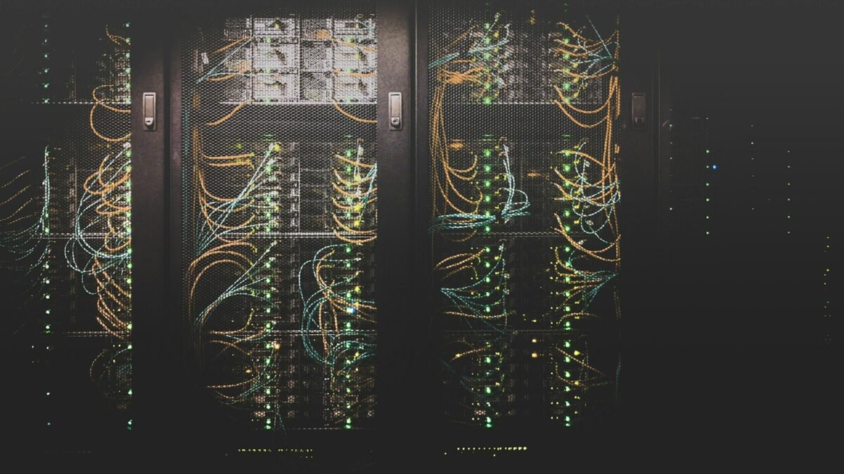 Server racks and network cabling inside a data center